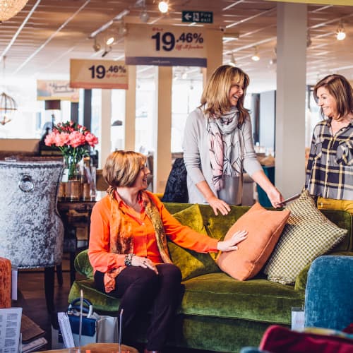 Women shopping at a furniture store